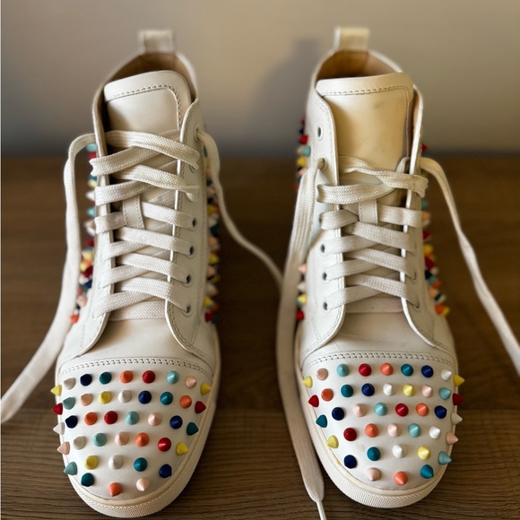 Christian Louboutin High-top sneakers, studs, multi-color  Christian Louboutin White High-Top Sneakers with Multicolor Studs